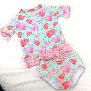 RuffleButts rashguard SPF swimsuit SPF